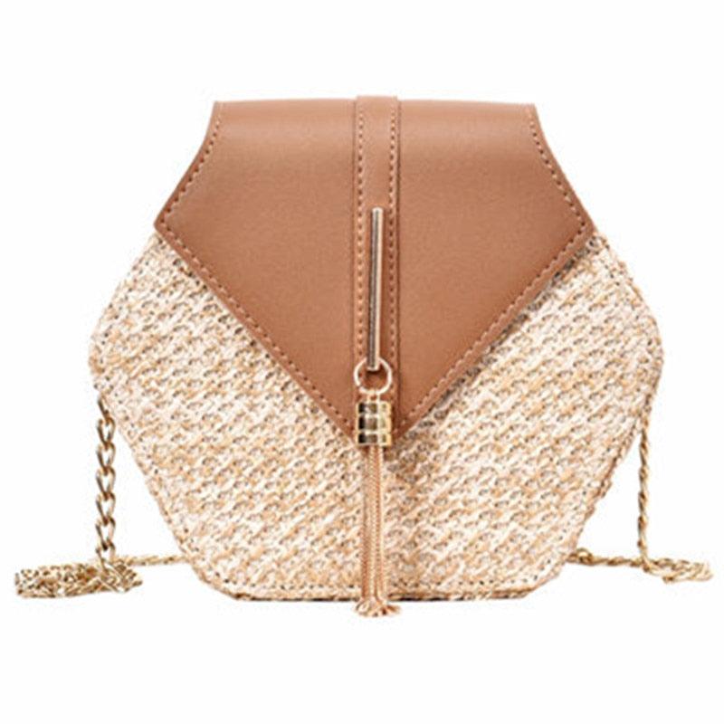 a close up of a purse on a tennis racquet