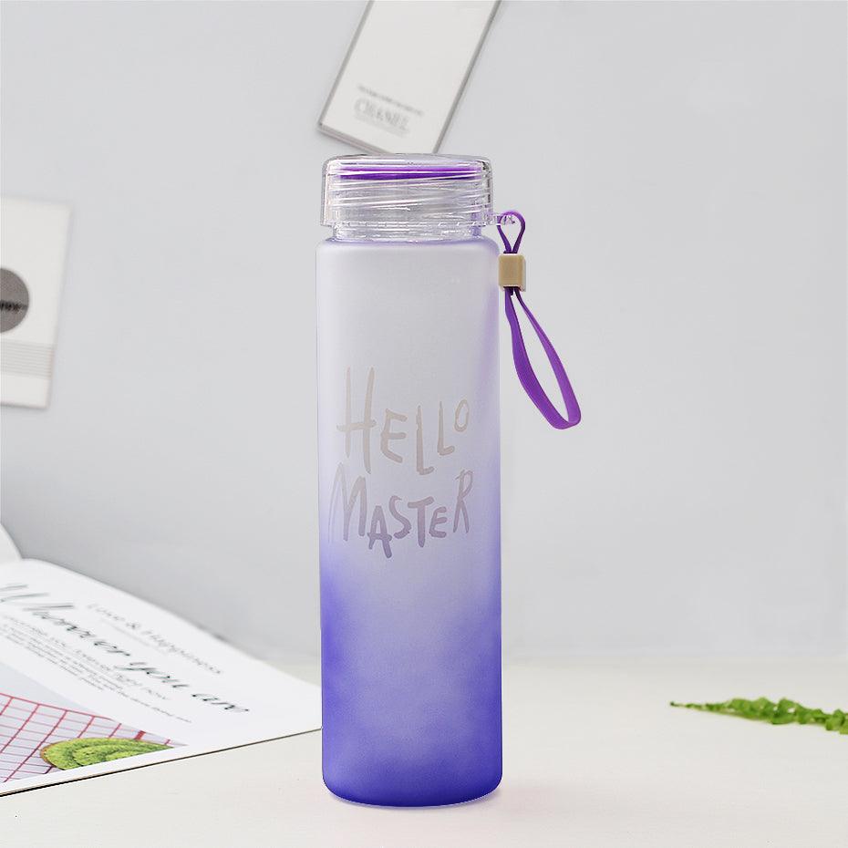 a purple toothbrush is in a purple glass