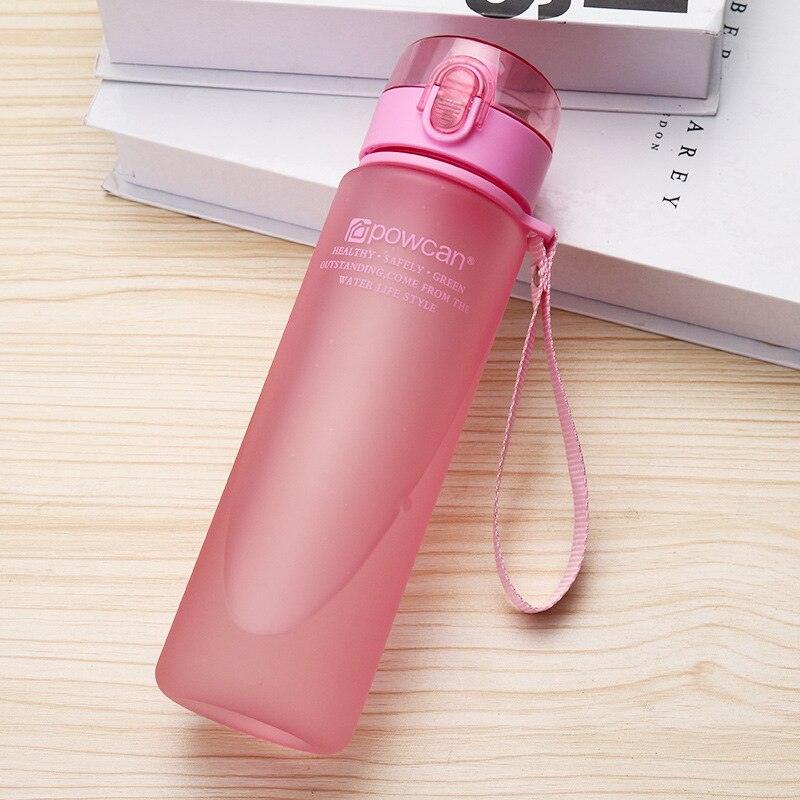 a pink toothbrush is sitting on a table