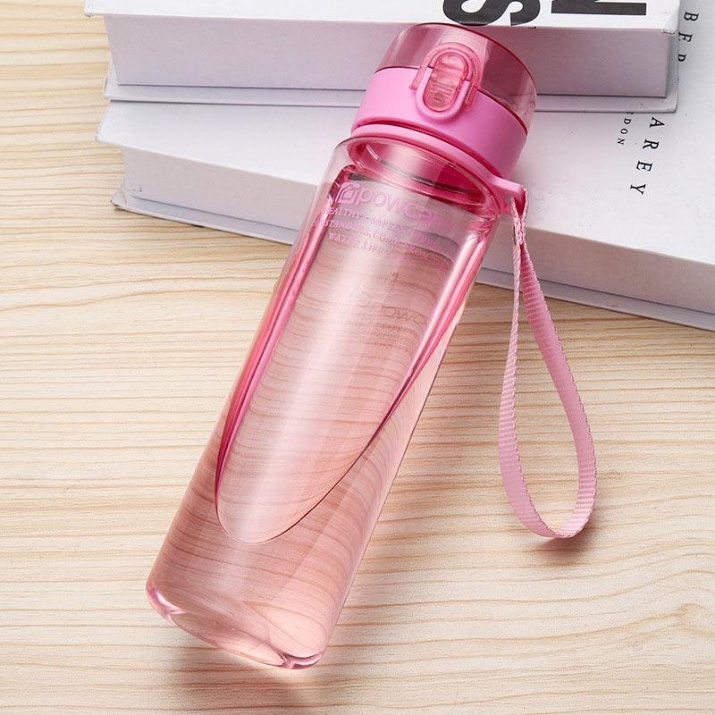 a pink tooth brush sitting on a table