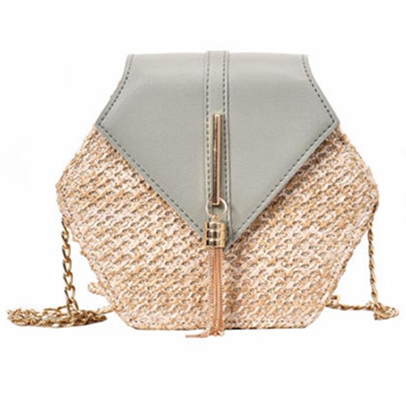 an umbrella is sitting on top of a purse