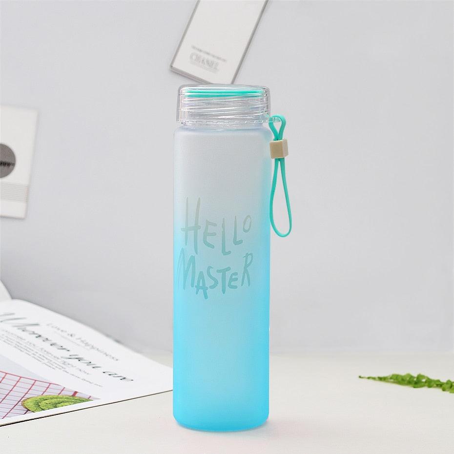 a cup with a toothbrush in it sitting on a table