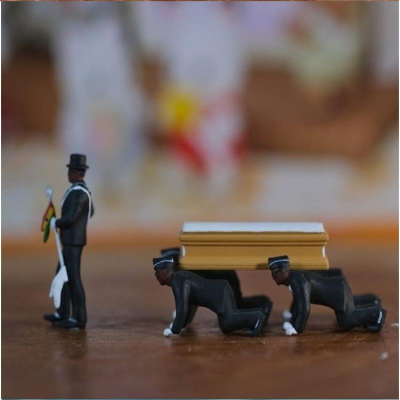 Ghanian Dancing Pallbearers - lightbulbbusinessconsulting