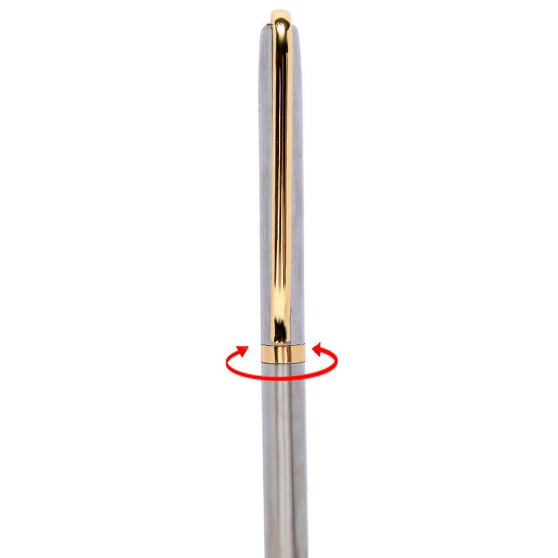 a close up of a toothbrush in a glass vase