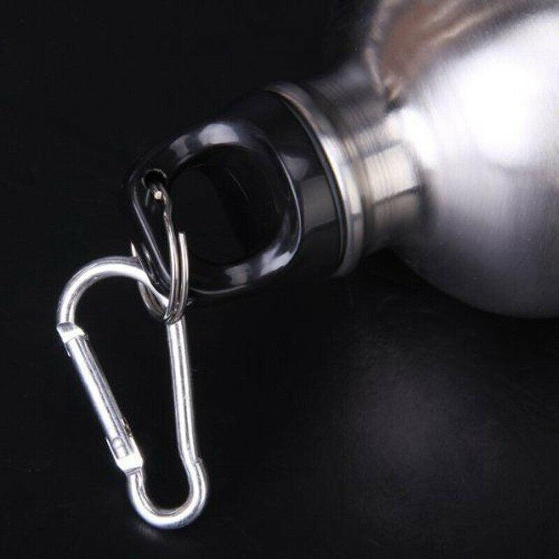 a bottle of water and a pair of scissors 