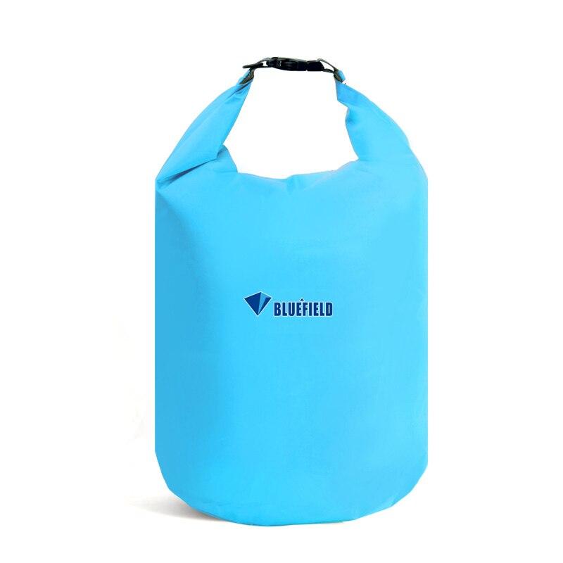 a blue suitcase is sitting on a table 