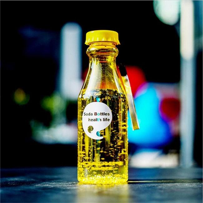 a bottle of alcohol sitting on top of a table 