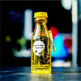 a bottle of alcohol sitting on top of a table 
