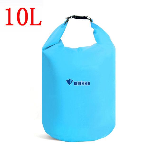 a blue suitcase is sitting on a table 