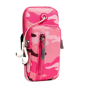 a pink suitcase is sitting on a bench 