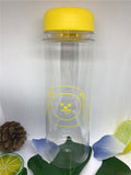 a glass vase with flowers in it on a table 