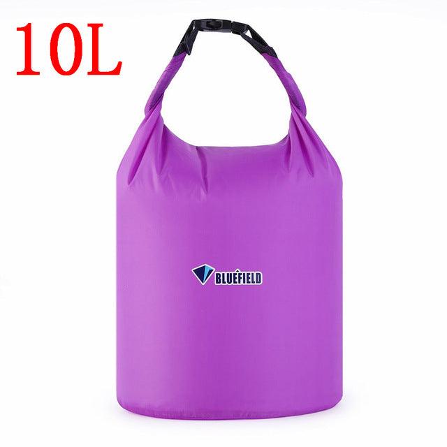 a purple pink suitcase is in a purple vase 