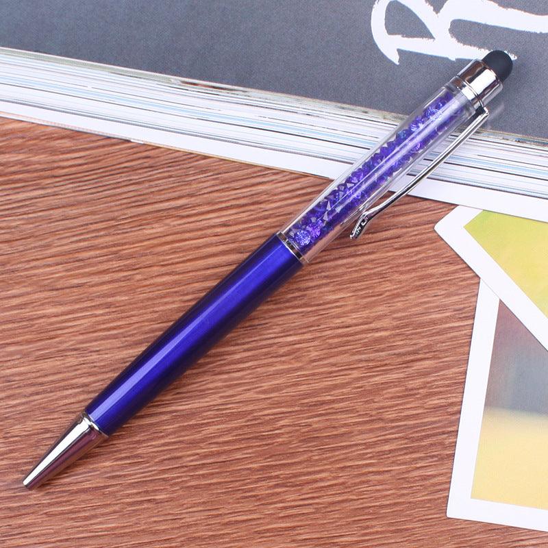 a pair of blue scissors sitting on top of a table 