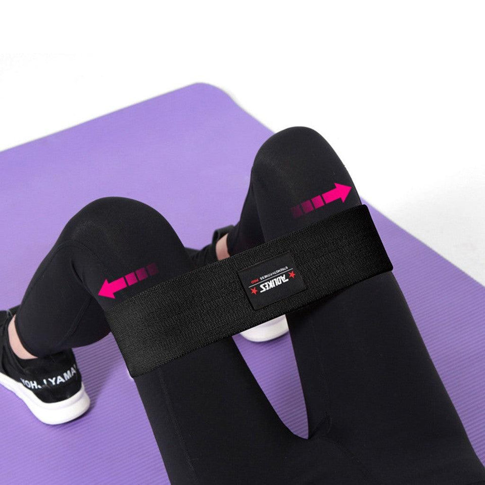 a close up of a pink and black suit case 