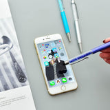 a cell phone sitting on top of a table 