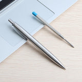 a pair of scissors sitting on a table 