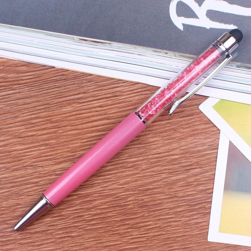 a pink toothbrush is sitting on a table 