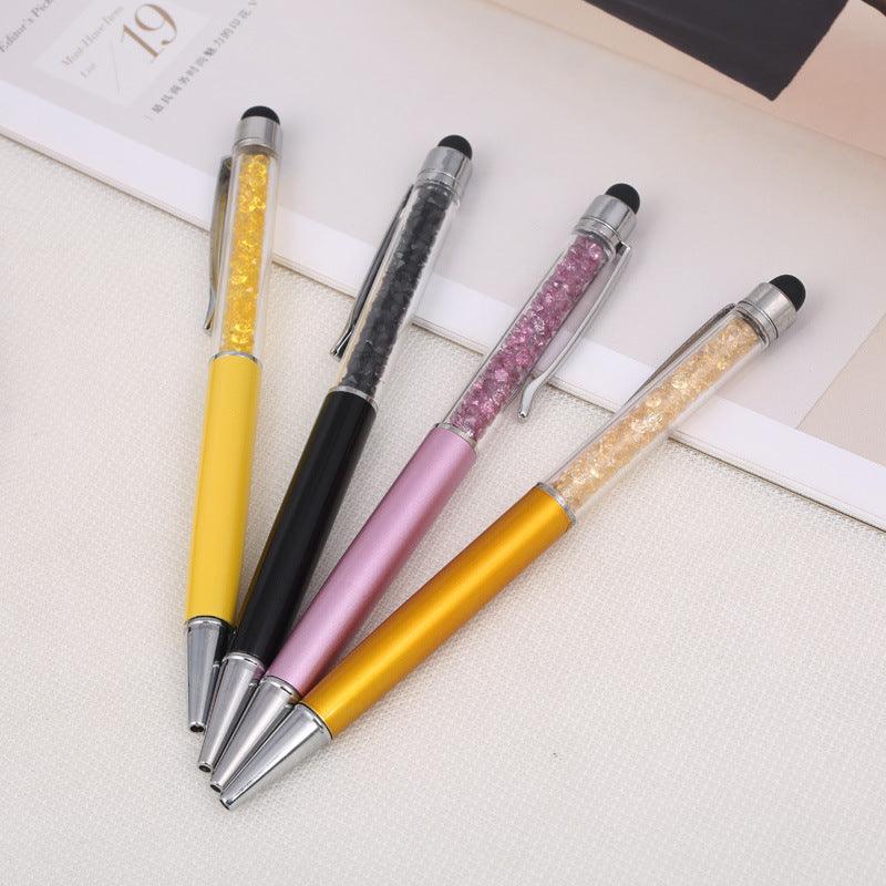 a bunch of pens pencils and a pair of skis 