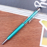 a green and blue tooth brush sitting on a table 