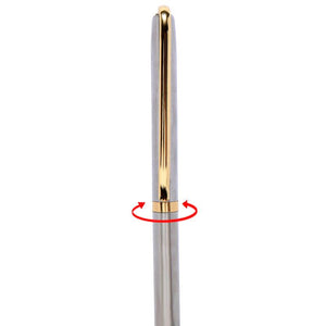 a close up of a toothbrush in a glass vase 