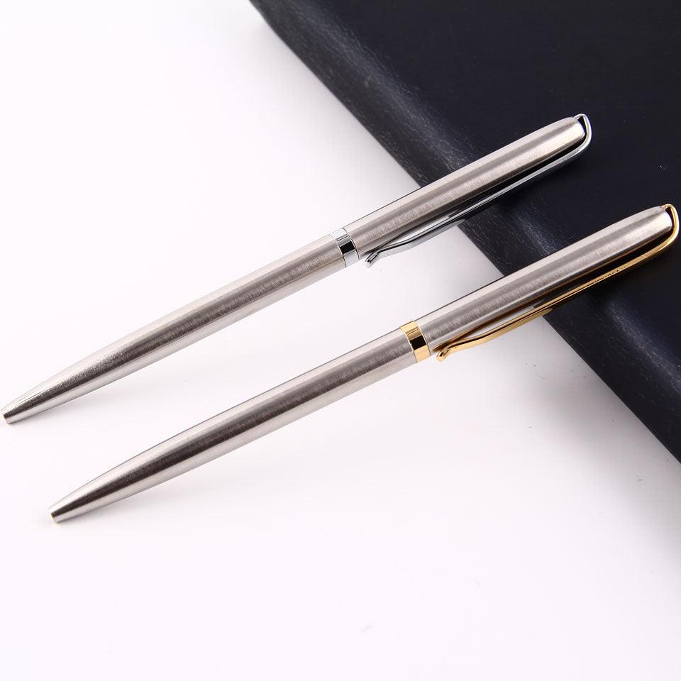a pair of scissors on a white surface 