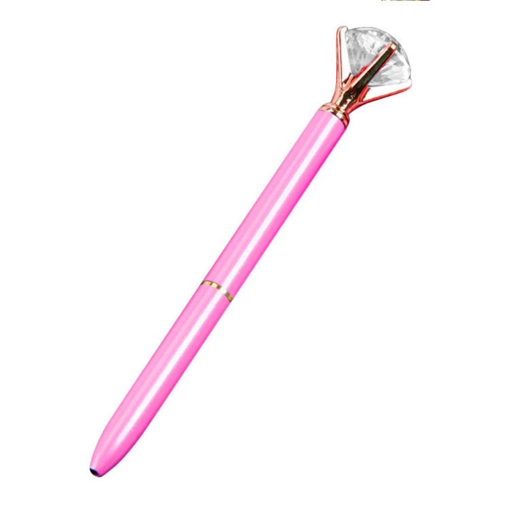 a pink toothbrush is sitting on a table 