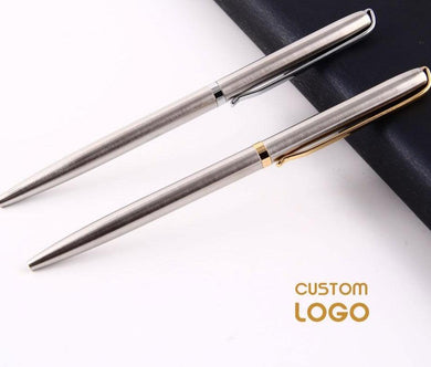 a pair of scissors sitting on top of a table 