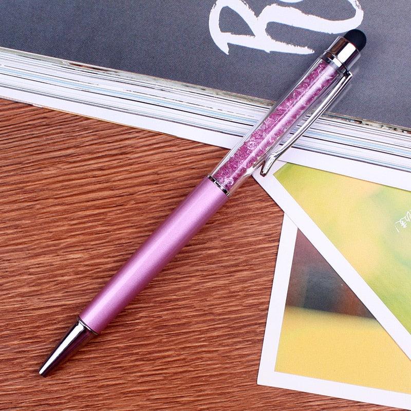a pink toothbrush is sitting on a table 