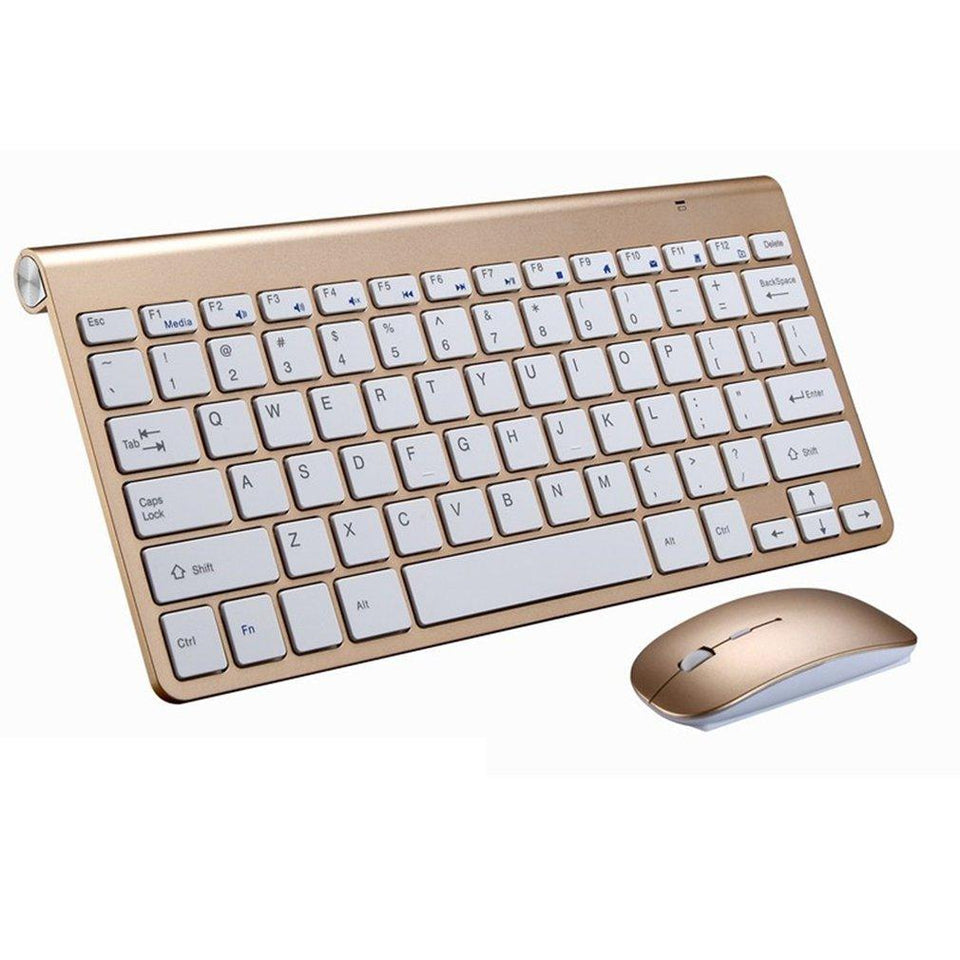 a computer keyboard sitting next to a mouse 