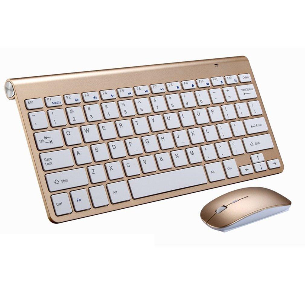 a computer keyboard sitting next to a mouse 