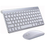 a computer keyboard sitting next to a computer mouse 