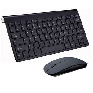 a computer keyboard sitting next to a computer mouse 